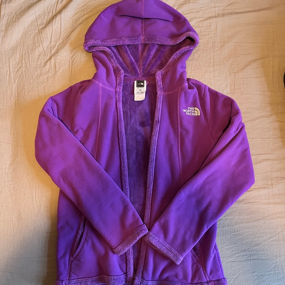 Purple fuzzy north face jacket